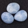 blue calcite palm stone healing crystals 700x700