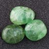 green fluorite palm stone healing crystals 700x700